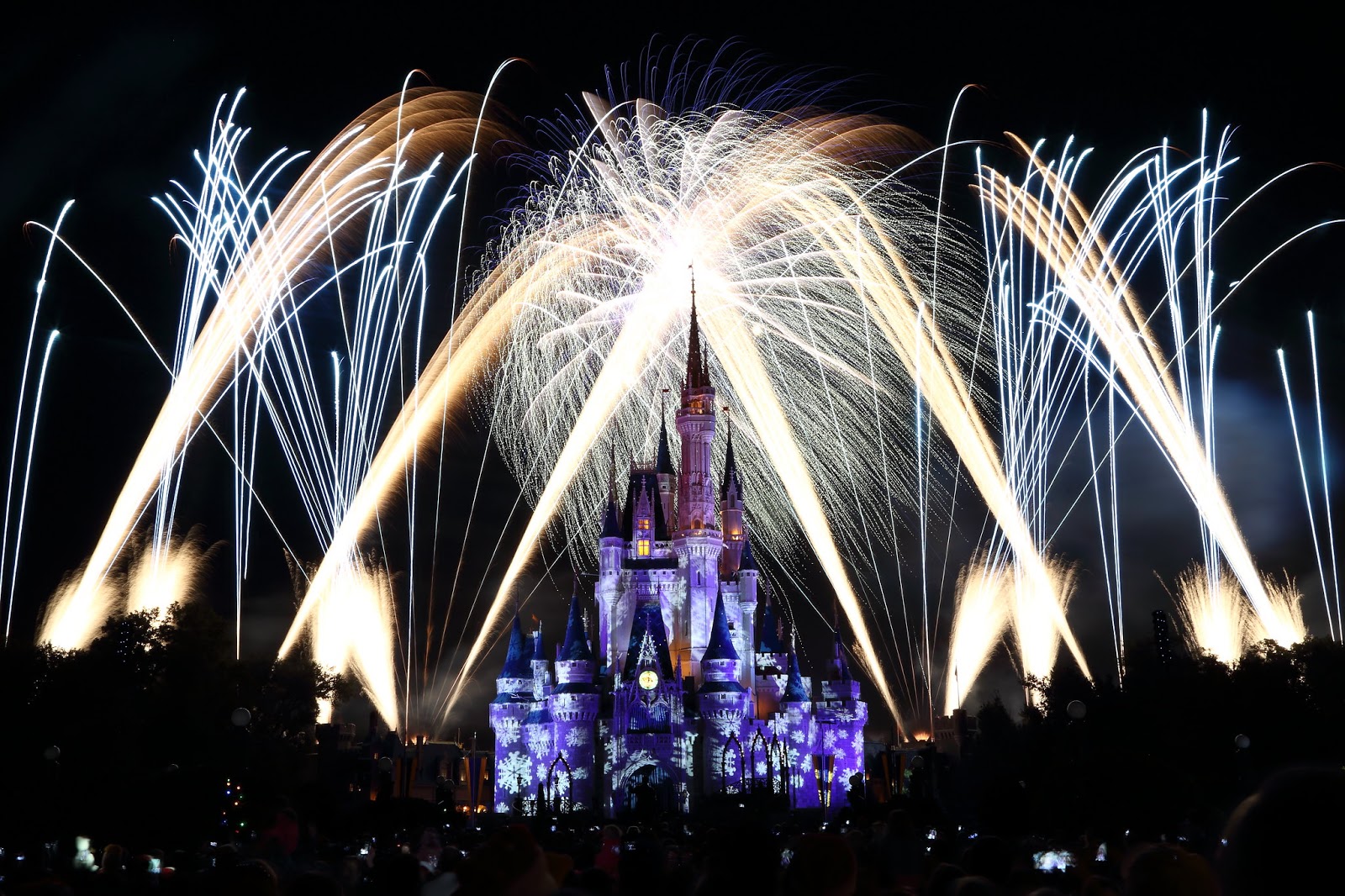 Fireworks being blown off during Mickey’s Very Merry Christmas Party