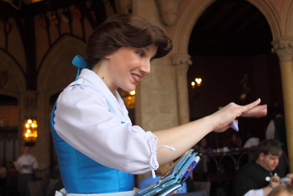 cinderella visiting with guests inside Cinderella’s Castle