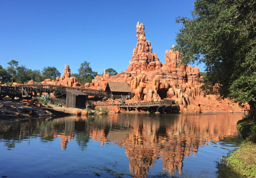 View of Big Thunder Mountain from Tom Sawyer’s Island at Disney’s Magic Kingdom. Guests are able to use a DAS pass for this popular attraction.