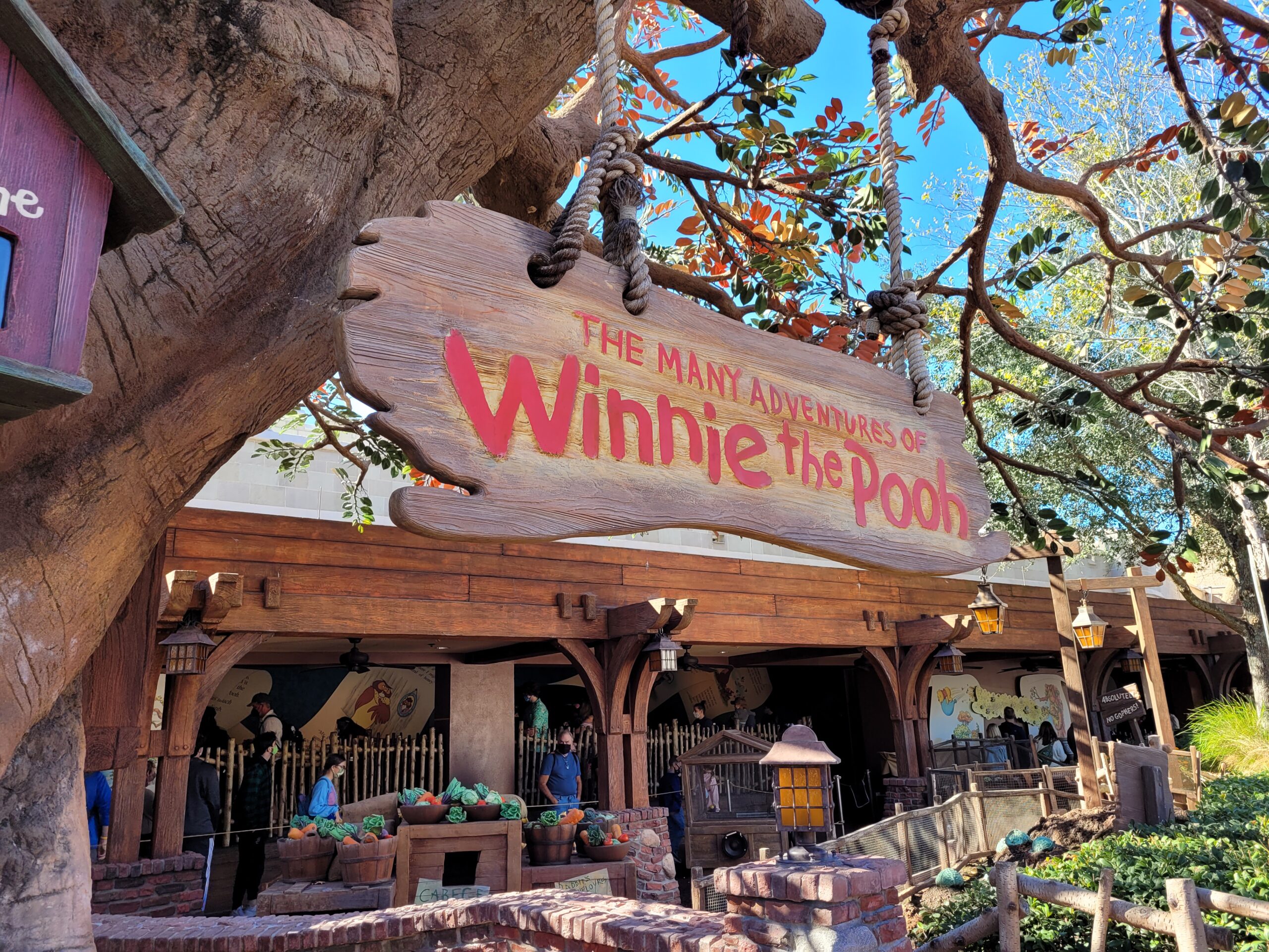 The Many Adventures of Winnie the Pooh Sign