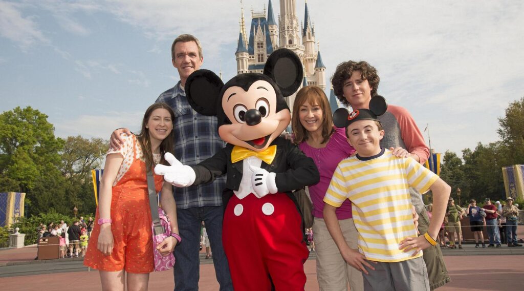 The Family from the Middle TV show in front of Cinderella Castle.