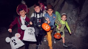 Children trick or treating at Disney