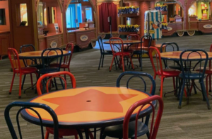 Big Top Souvenirs Reopens with tables and chairs to dine indoors - Disney Magic Kingdom