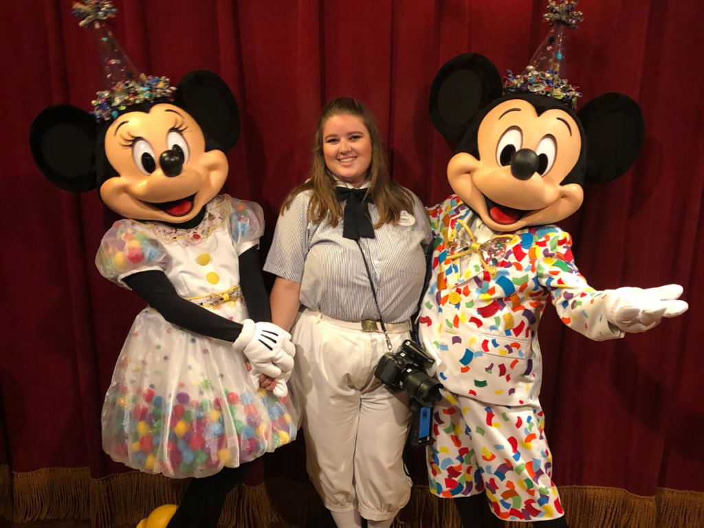 Mickey and Minnie with Disney Cast Member