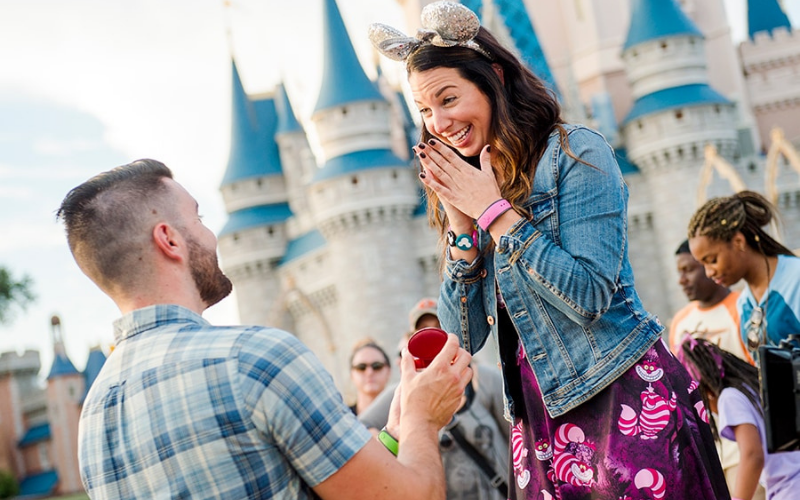 Couple getting engaged at Disney