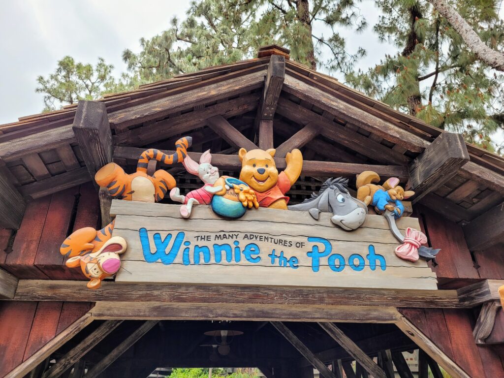 The Many Adventures of Winnie the Pooh Sign - Disneyland