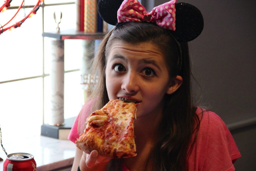 mickey mouse eating pizza