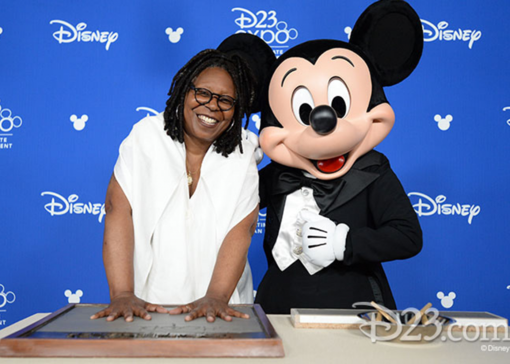 Whoopi Goldberg with Mickey Mouse
