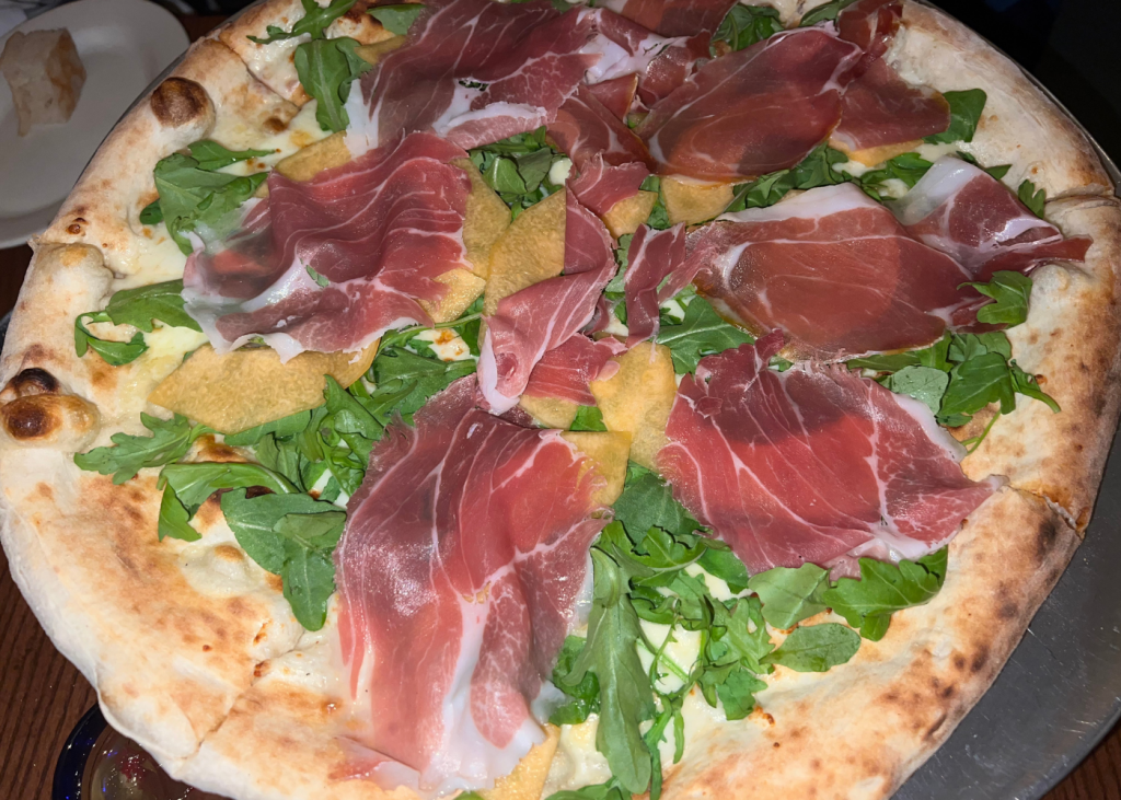 Pizza de prosciutto y melón