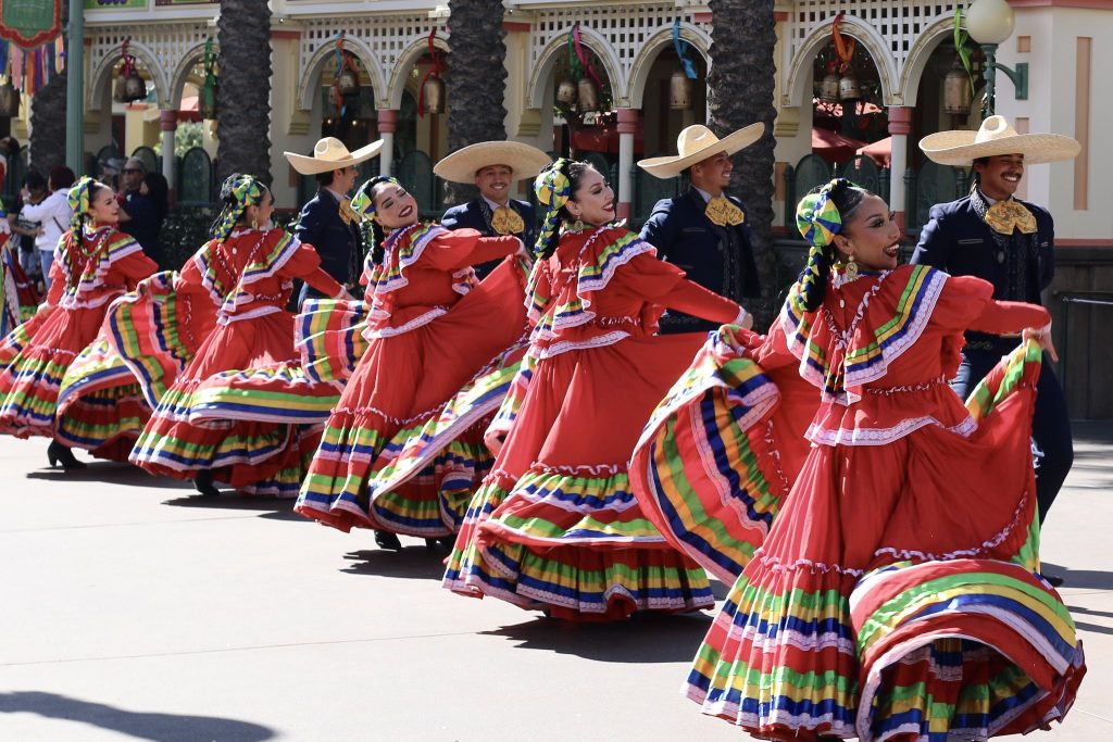 Dancers fill the street for the dance party, photo by Bobby Asen