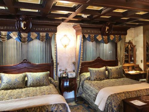 Cinderella Castle Suite Double Beds in the main bedroom